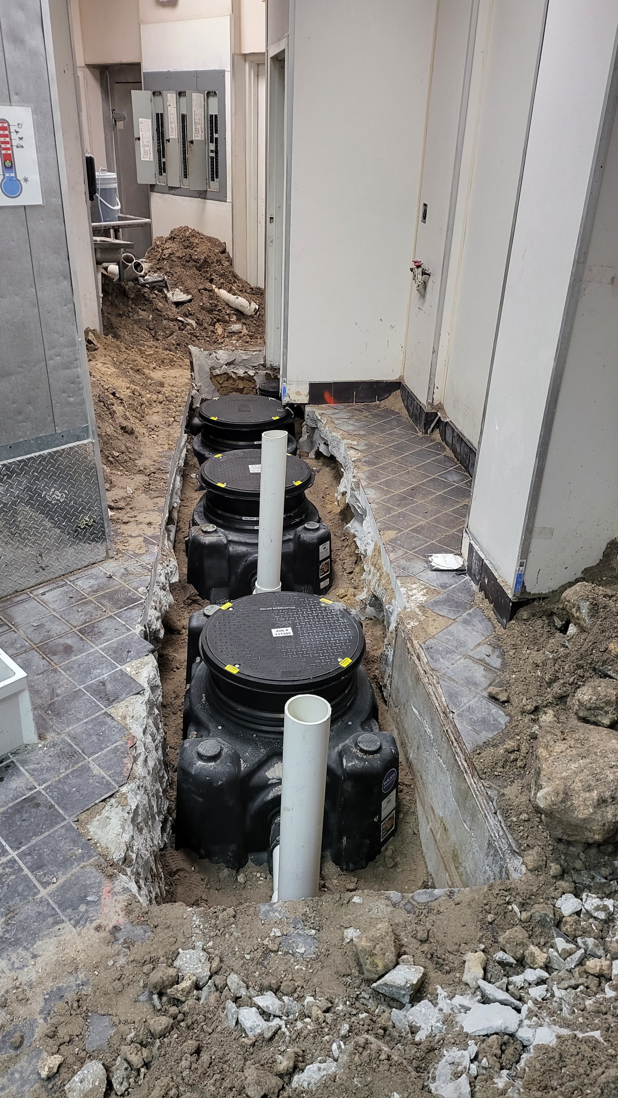 Installed grease interceptor system at MORDISCOS